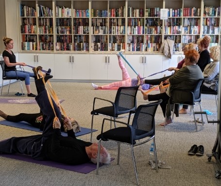 a group of ladies working out together